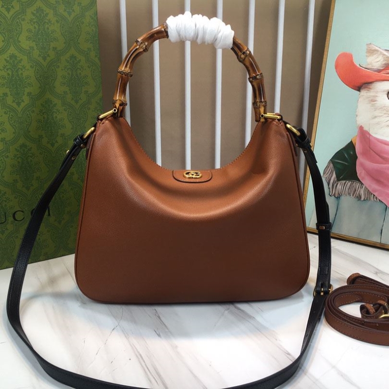 G*u*i top handle bags